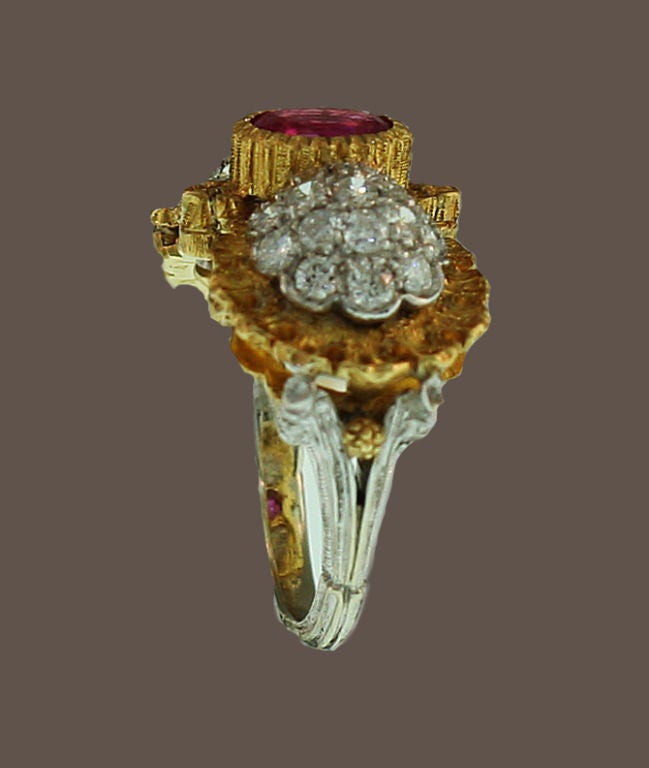 Buccellati ruby and diamond ring , classic version of a three stone but interpreted with the artistry and character of Buccellati