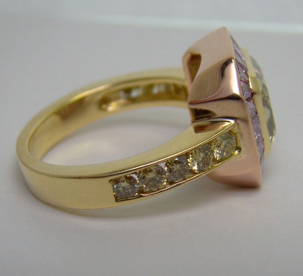 Green Chameleon Center Diamond w/ Pink & Yellow Diamonds in 18K. <br />
Please call for more details