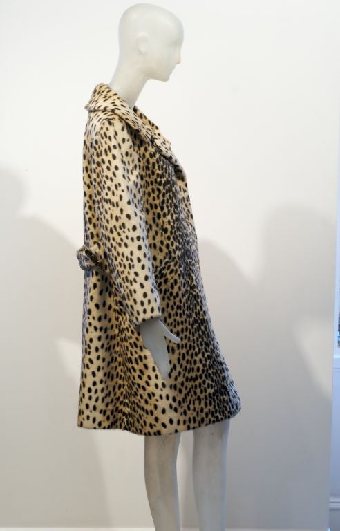 We recently discovered that the FF logo on Fendi bags, etc... stands for Fun Fur.  Now, this is what we call a Fun Fur!  It is also what we call Perfect!  The perfect leopard coat while not being an actual leopard.  So, wear with confidence as it is