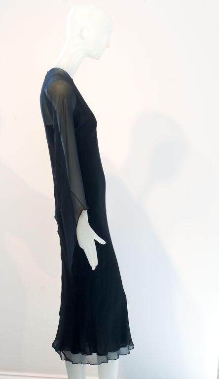 Absolutely beautiful, sexy and timeless Halston black ensemble.  A simple bias cut slip is worn with a black chiffon bias cut dress over it.  Simple, gorgeous, comfortable: just what Halston did so well.