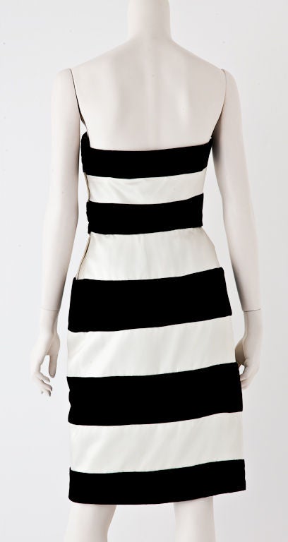 Victor Costa graphic design  strapless dress of ivory satin with bands of black velvet. Beautifully thought out pattern in a flattering silhouette. Great cocktail dress!