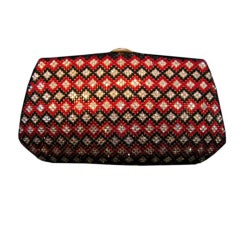 Finesse La Model Red, Black and Silver with Gold trim clutch.