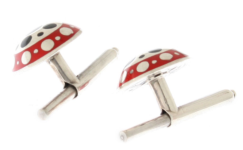 These are great looking cufflinks.  The fronts are domed and they have beautiful enamel work.