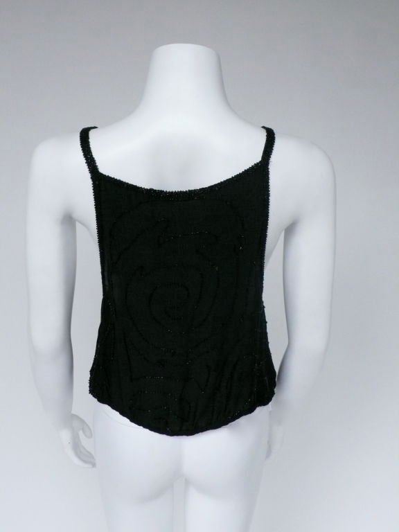 1920-30's Silk shell, jet beaded with spiral design throughout.