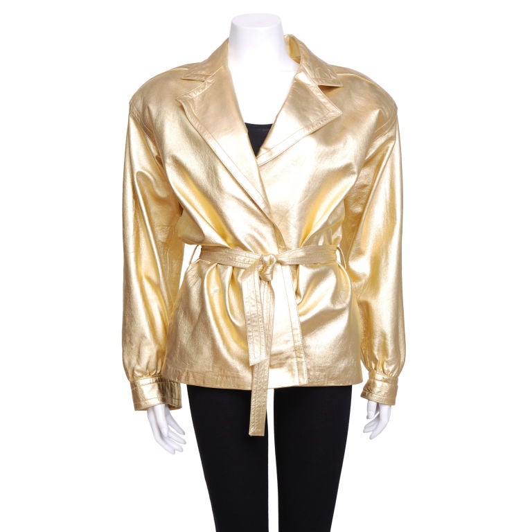 YSL metallic leather jacket with robe tie, shoulder pads, fully lined in gold silk satin.