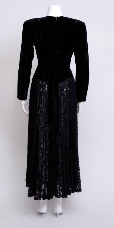 Norma Kamali  black long sleeve velvet dress, with full cotton lace sheer unlined skirt, and velvet tie at the back. The sizing of the dress is marked 8 but fits more a 4/6.