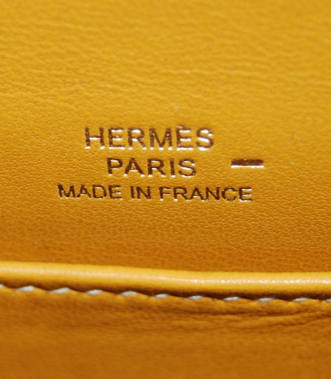 Hermes Kelly Pochette Sesame Lizard Gold Hardware | L Stamp<br />
<br />
The pochette measures 21.5 cm/ 8.5