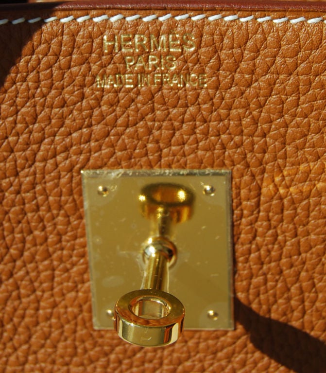Hermès Birkin 35cm in Natural Taurillon Clemence Leather and Toile H | Gold Hardware | L Stamp<br />
<br />
Beautiful bag!<br />
<br />
The bag measures 35 cm/ 14