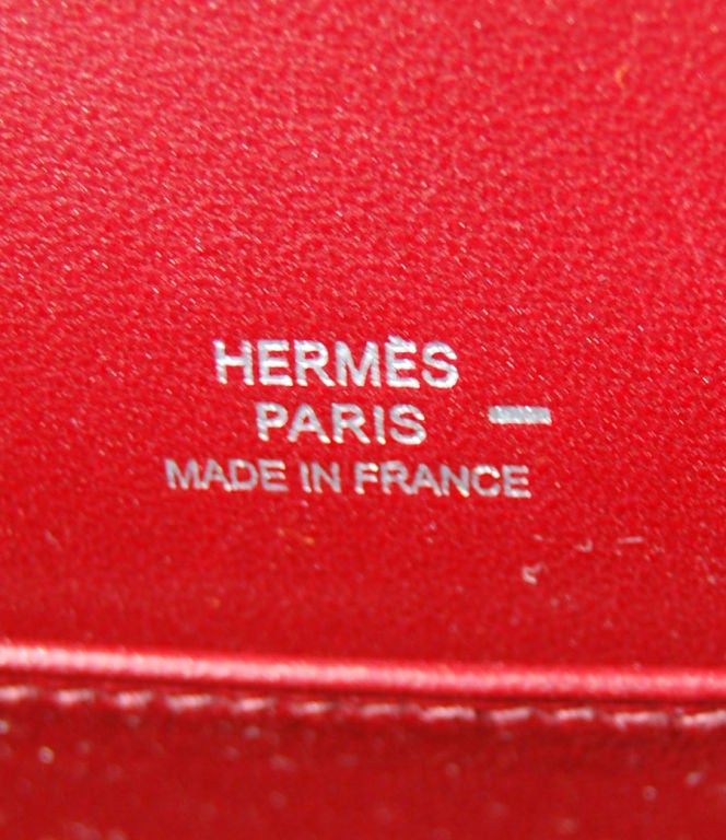 Hermes Kelly Pochette Rouge Moyen Lizard Palladium Hardware <br />
K Stamp<br />
<br />
The pochette measures 21.5 cm/ 8.5