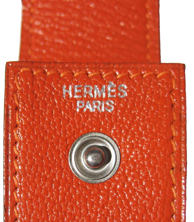 Chic Lipstick holder or for your chewing gum.<br />
<br />
Hermès bright orange leather holder measuring 3 1/2