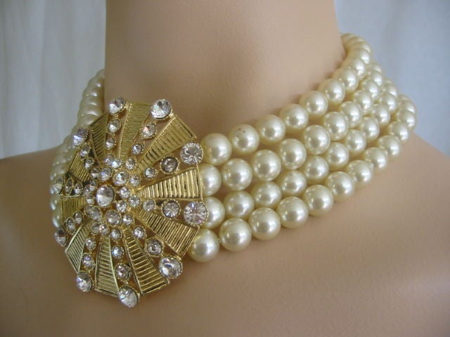 Description: RICHARD SERBIN Stunning Crystal Pendant Cream Pearl Necklace<br />
USA<br />
1980's<br />
Stunning Crystal Pendant Cream Faux Pearl Necklace from Richard Serbin<br />
<br />
Created in the early 1980's for the Runway collection of
