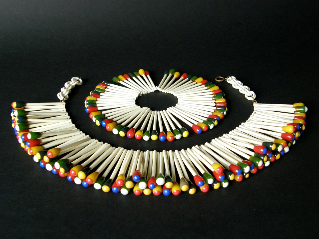 This phenomenal necklace and bracelet set was designed by Martha Sleeper, who was the most famous of the bakelite jewelry designers. Having established herself as a successful actress on both the stage and screen, she turned her attention to jewelry