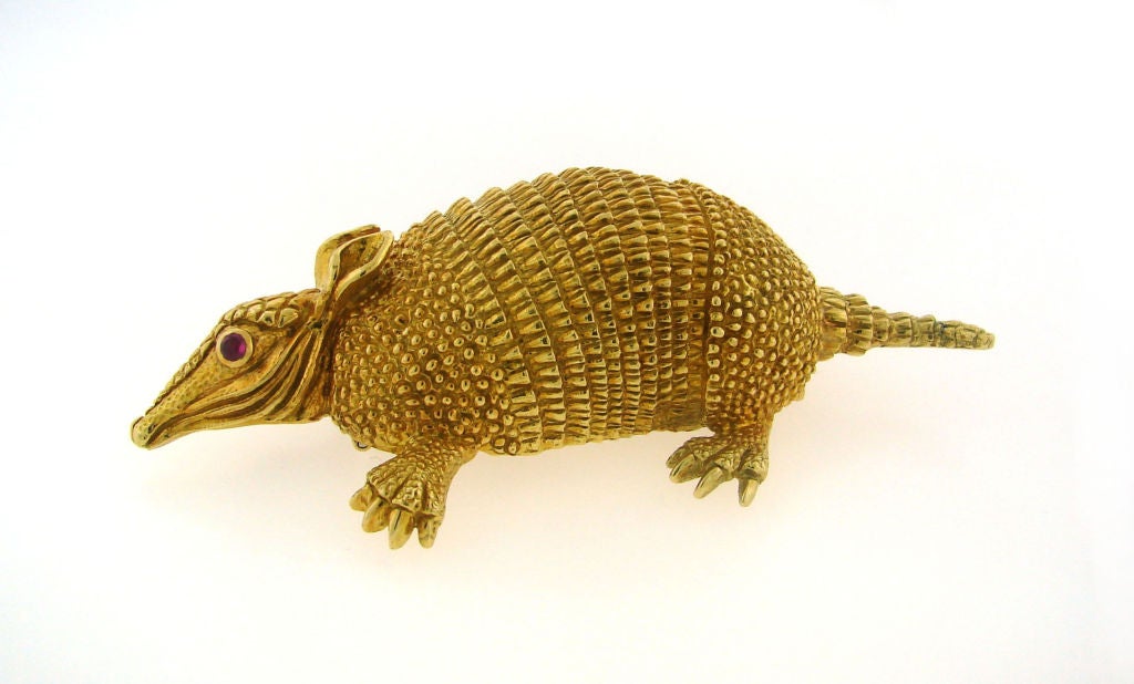 18k Yellow Gold Armadillo Pin with Ruby Eyes<br />
Length 3 1/2