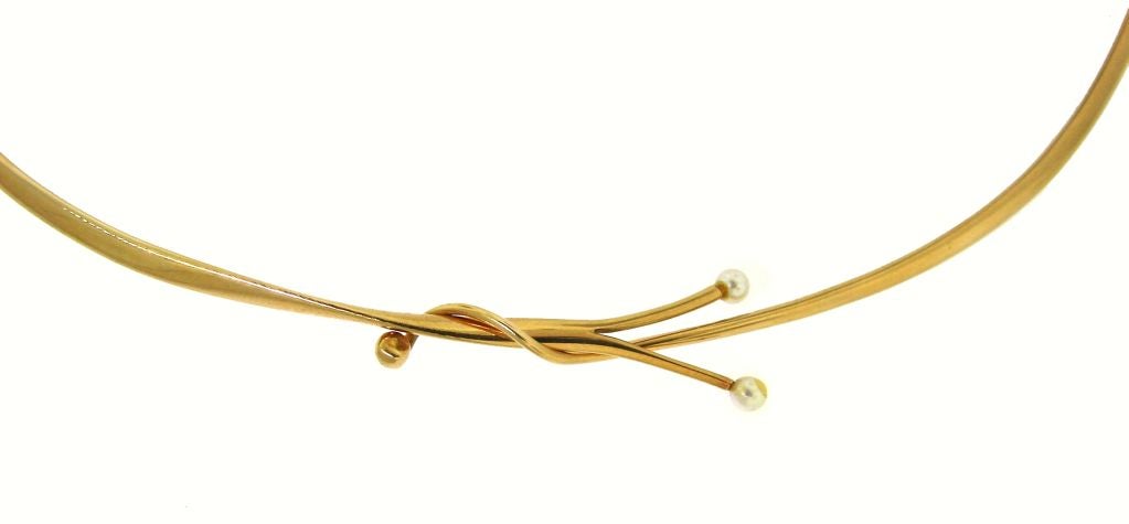 This delicate seed pearl and yellow gold wire choker was created by Georg Jensen in the 1970's.<br />
The necklace comes in the original fitted box.<br />
Pearls are 3.2 mm in diameter<br />
The gold wire is 1/8