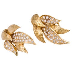 beautiful 18 kt. diamond leaf earrings
