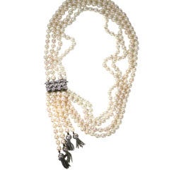 Pearl necklace with diamond clasp and tassels