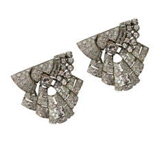 Pair of art deco diamond and platinum dress clips (brooches)