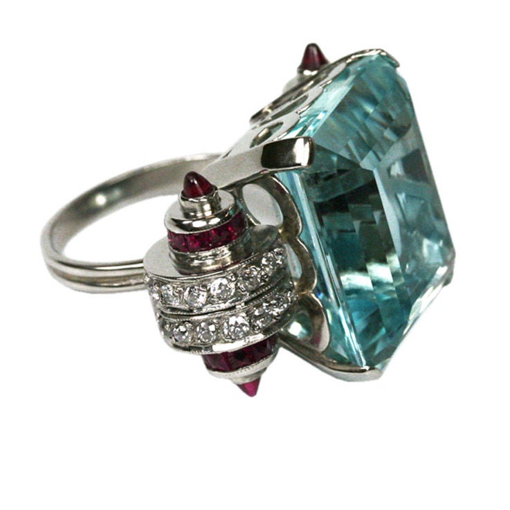 Cartier-style art deco aquamarine, diamond, ruby ring