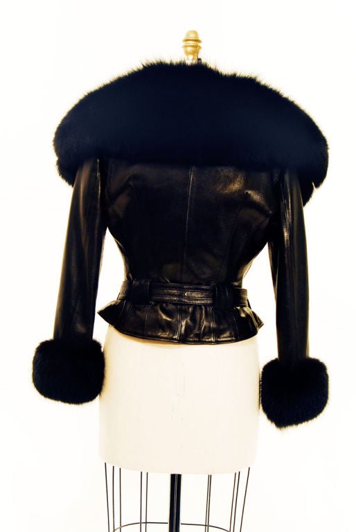 Exquisite vintage Jean Claude Jitrois lambskin motorcycle zip jacket with fox fur trim. Authentic 1980s item made in France. Cinch waist item features zipper closure & matching leather belt. No size label & appears to fit a modern US size 8-10.