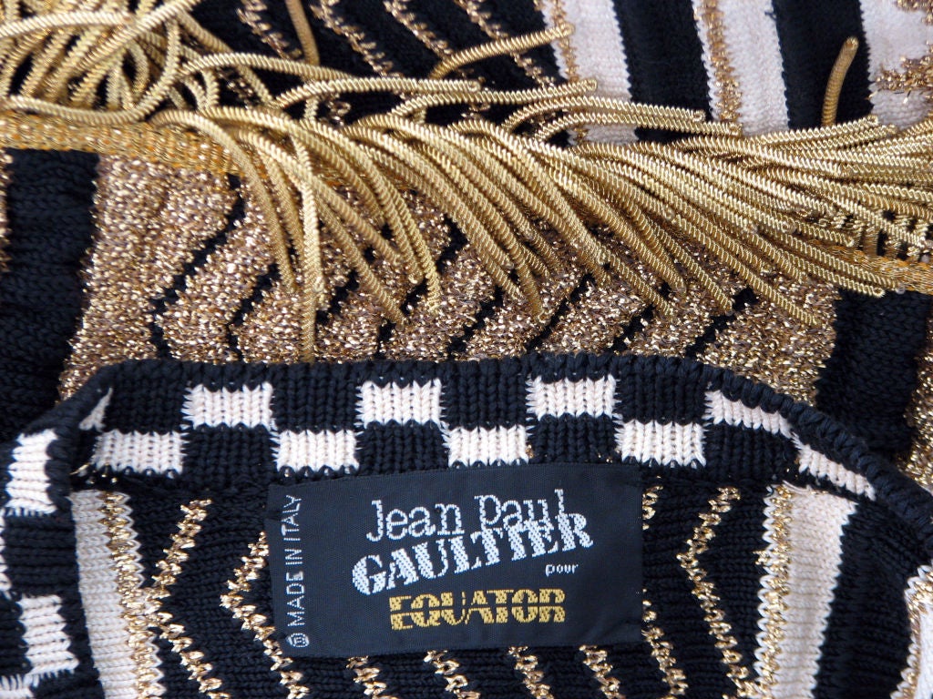 Fine & rare vintage Jean Paul Gaultier 'Equator' metallic knit/gilt fringe waistcoat. Authentic unisex item made in Italy. Item zips up front with gilt metal fringe hem. Item labeled size 48 & appears to fit a modern US size M/L.