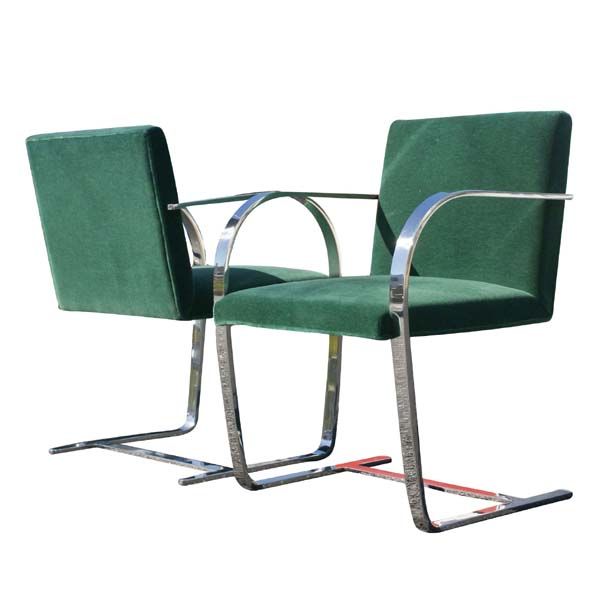 Set of four Brno chairs made by Knoll with polished stainless steel frames and original green mohair fabric.  Originally designed by Mies van der Rohe in 1930, these examples were produced in 1987.