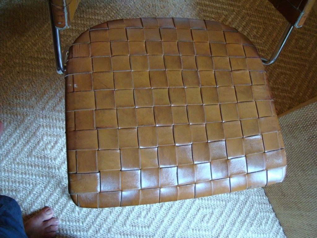 A Set of Four (4) Unique Woven Leather Chairs on Chrome bases. 5