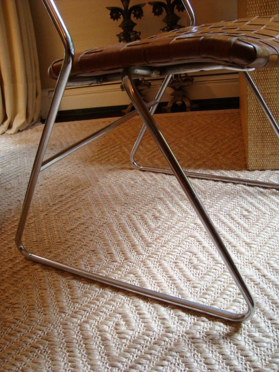 A Set of Four (4) Unique Woven Leather Chairs on Chrome bases. 4