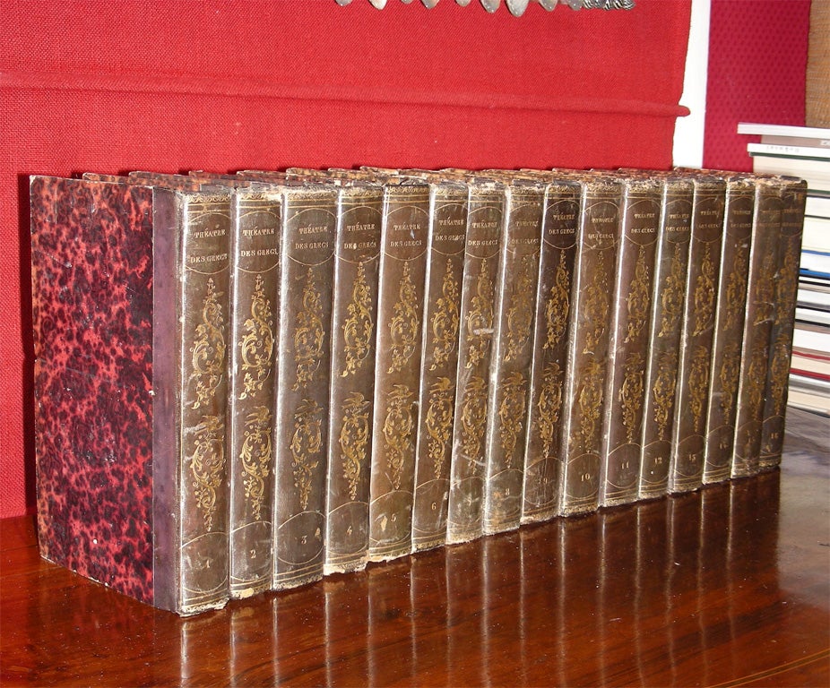 Sixteen 1826 volumes on Greek theater edited by M. Raoul-Rochette. Binding slightly worn but in good condition. Dimensions given are for one volume.