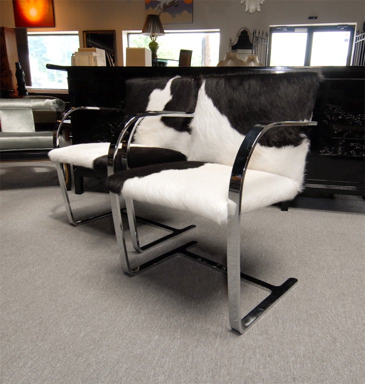 STUNNING PAIR OF BLACK AND WHITE COWHIDE BRNO CHAIRS 1