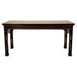 Antique English mahogany library table. Chinese Chippendale