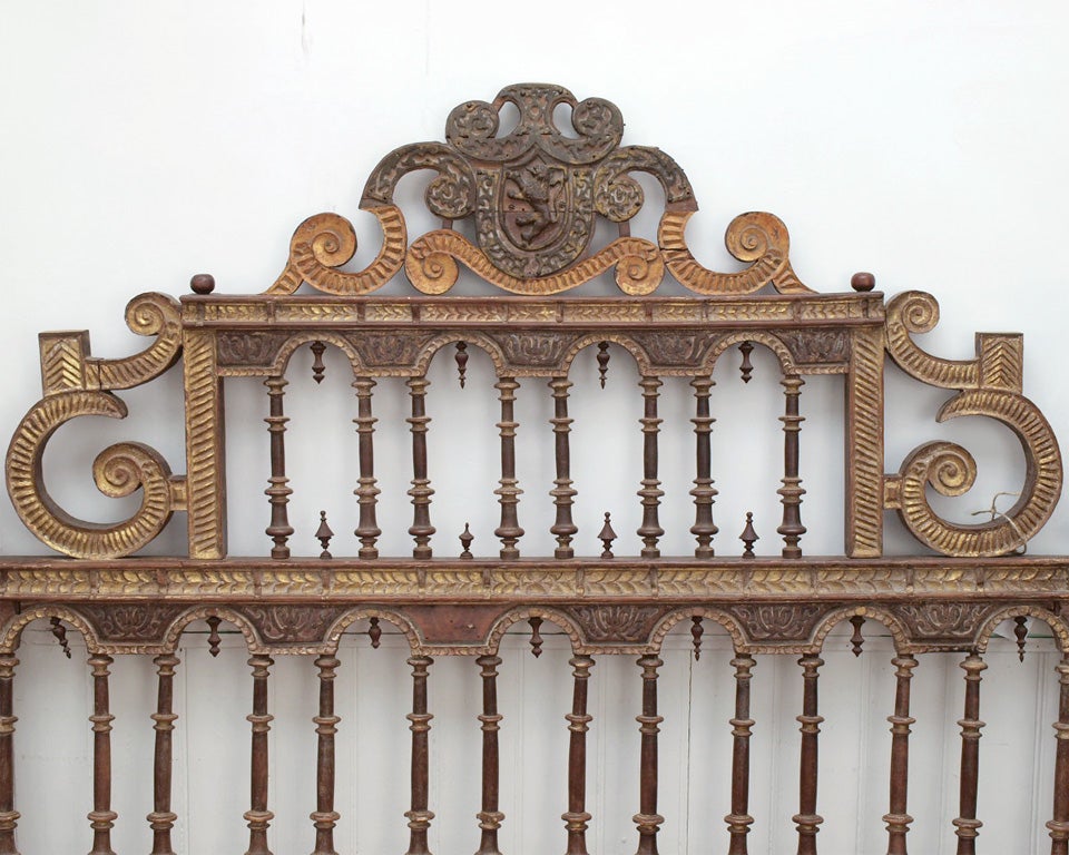 Carved wooden headboard, once part of complete bed; now suitable for queen-sized headboard