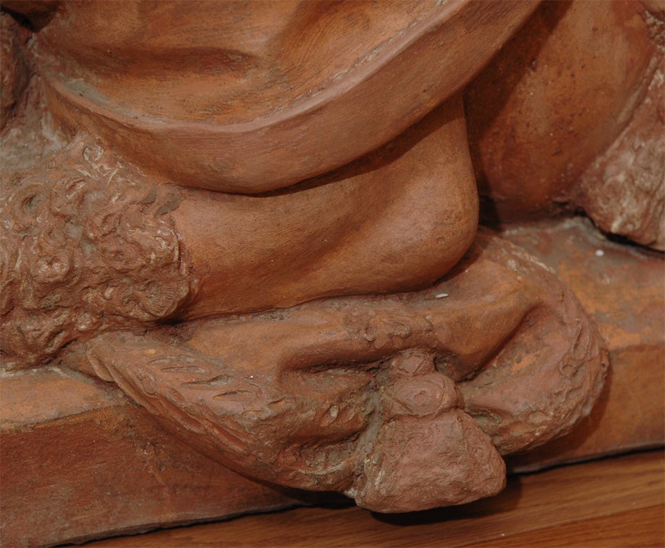 19th Century pr of terracotta 19th female headed sphinxs.