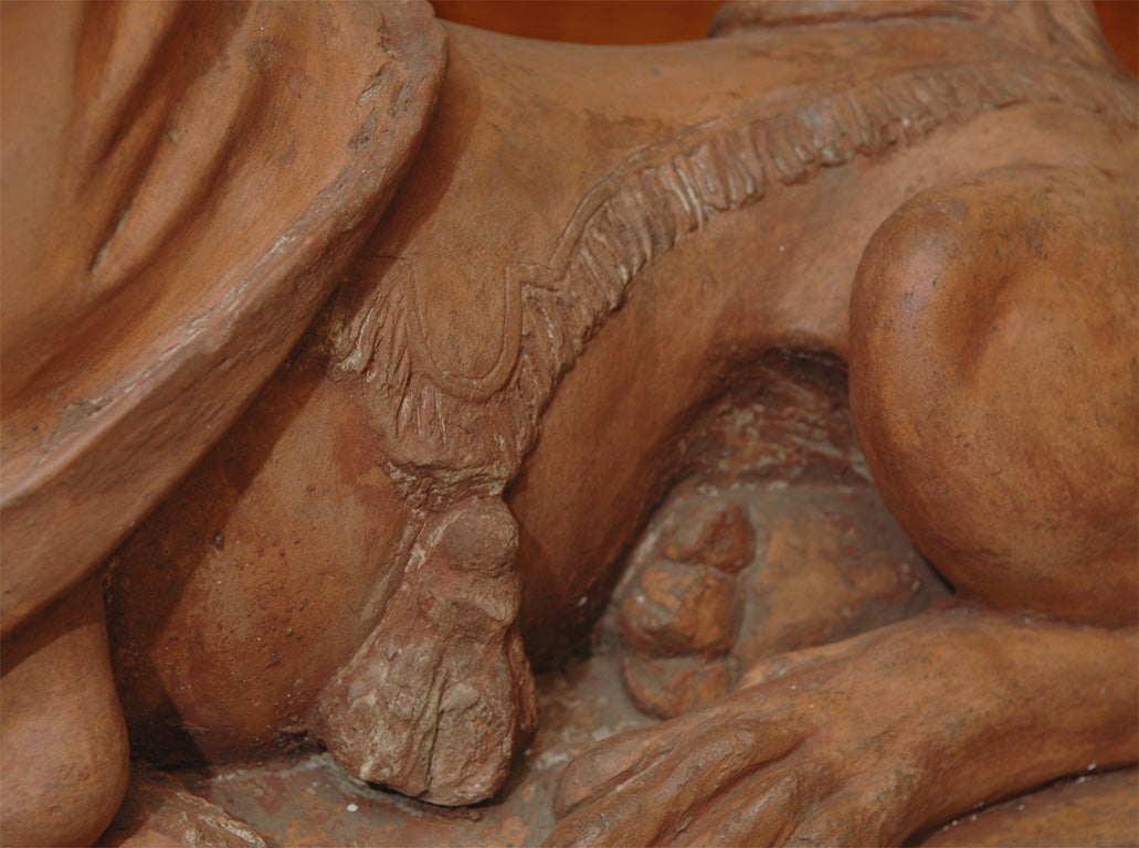 Terracotta pr of terracotta 19th female headed sphinxs.