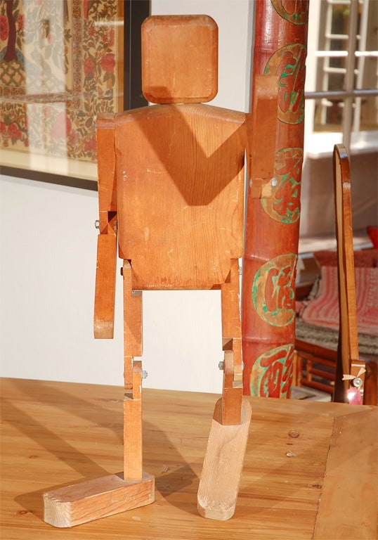 Charming wooden articulated man.