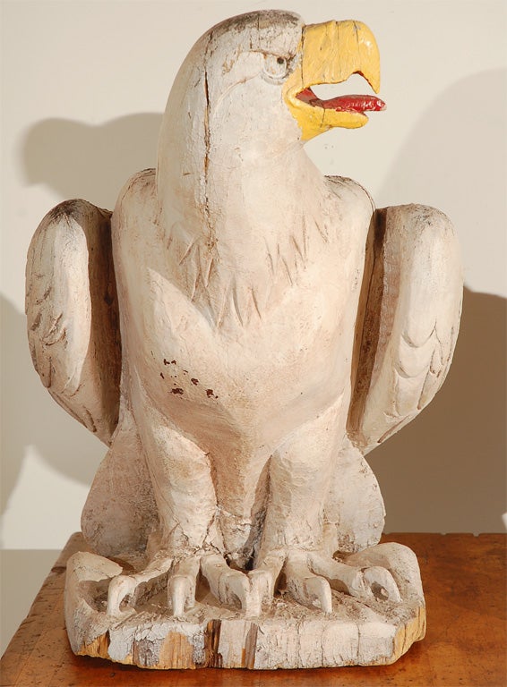carved wooden eagles