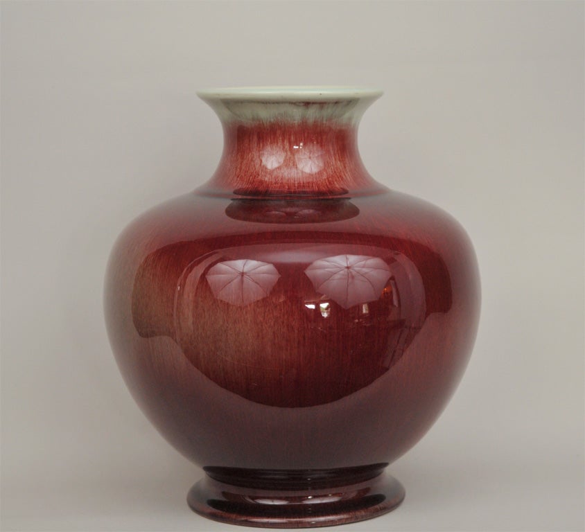 Bright cherry red oxblood lamp by California Gladding McBean Company. This glaze would make the Kanxi kiln masters envious! Circa 1930's. Excellent condition.