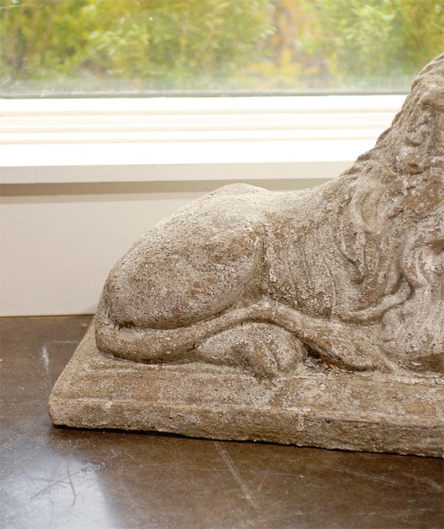 Pair of English Reclining Stone Lions on Bases from the Early 20th Century 1