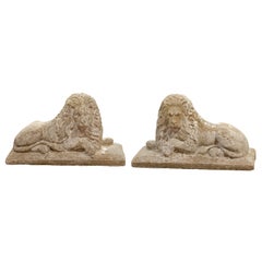 Pair of English Reclining Stone Lions on Bases from the Early 20th Century