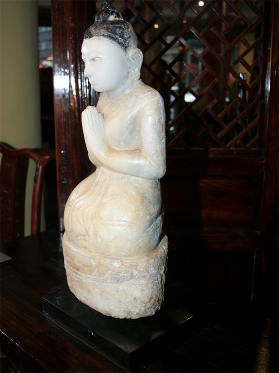 Rare Buddha, Shan style, Burma 17th century. Alabaster marble with traces of original Lacquer. Rare Kneeling pose. On museum base.