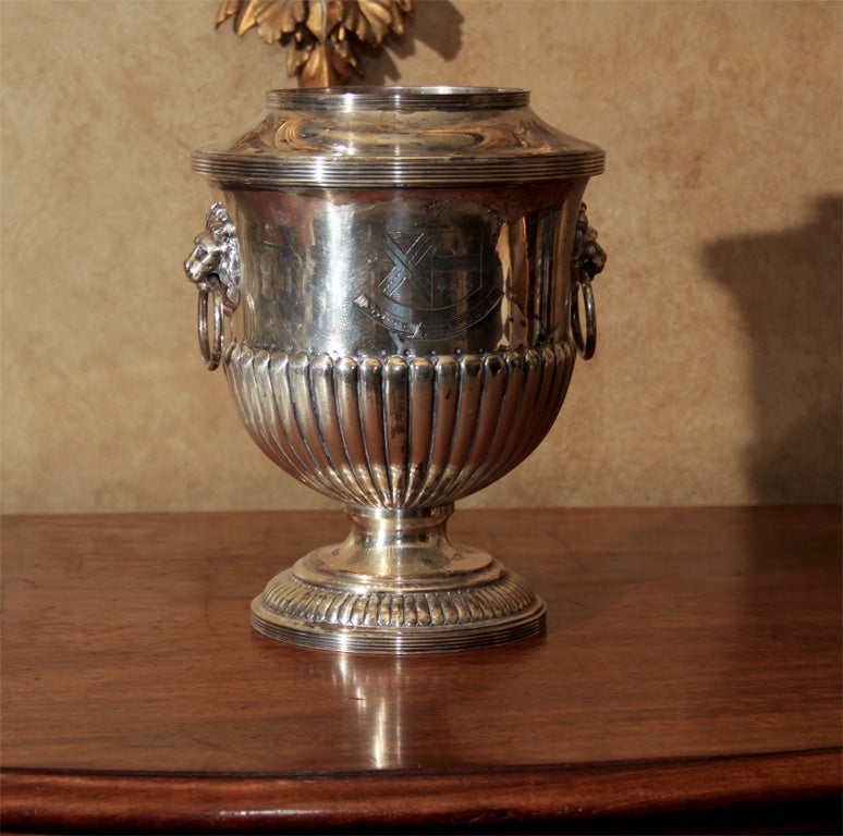 Classical shape with lion and ring handles. Engraved with crest.

OFFERED AT THIS 50% OFF PRICE FOR 2015 ONLY!