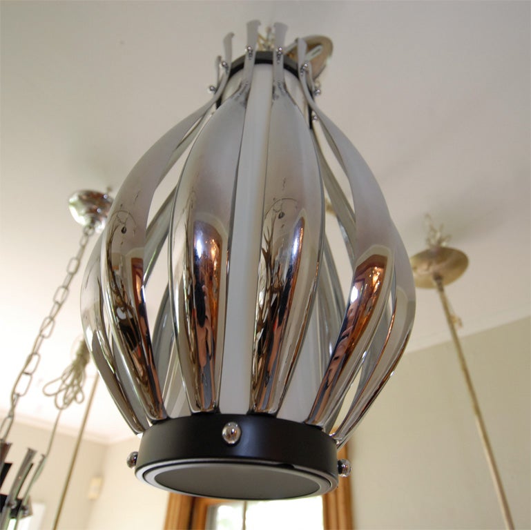 Pendant Composed of Multiple Chrome Slats with Opaque Glass Cylinder In Excellent Condition For Sale In Bridgehampton, NY