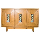 Tall oak buffet by Louis Sognot with ceramic tile insets