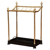 Antique English, brass umbrella stand with cast iron liner