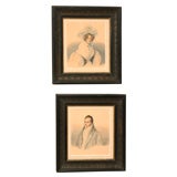 A pair of Beidermaier portrait of a Lady and Gentleman