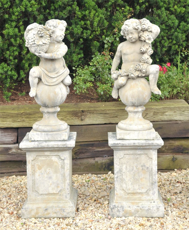 French Pair of Stone Putti on Pedestals For Sale