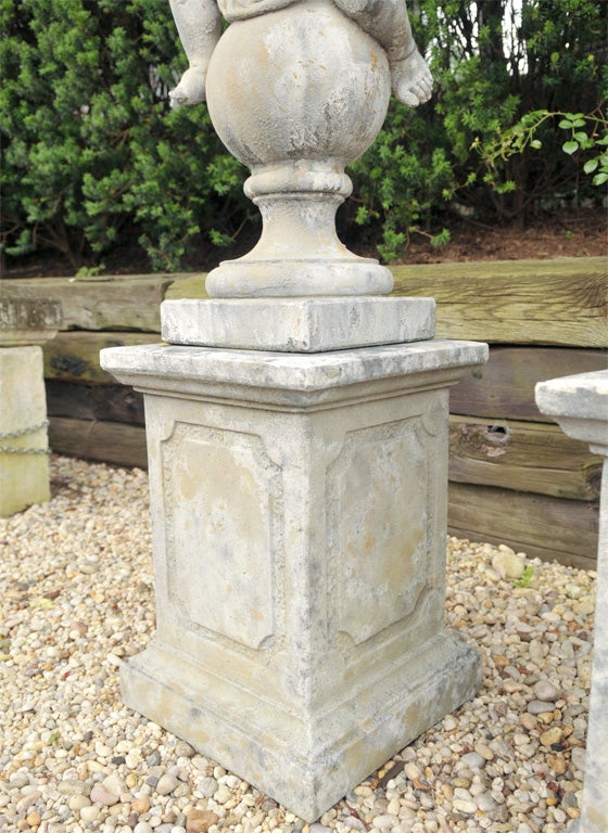Pair of Stone Putti on Pedestals For Sale 1