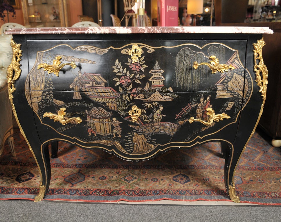 Spectacular chinoiserie. Marble top, two drawer chest with wonderful bronze mounts. Stamped Jansen.