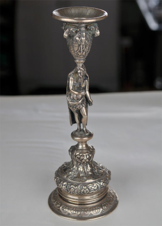 Set of Four Figural Sterling Silver Candle Sticks