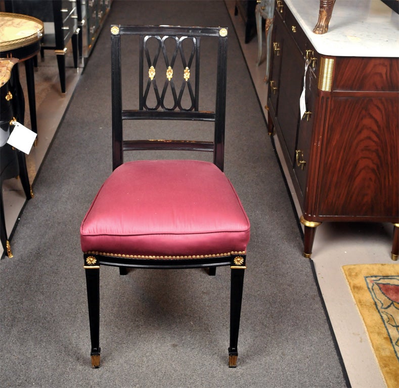 2 Stamped Jansen Ebonized and Gilt Dining Chairs