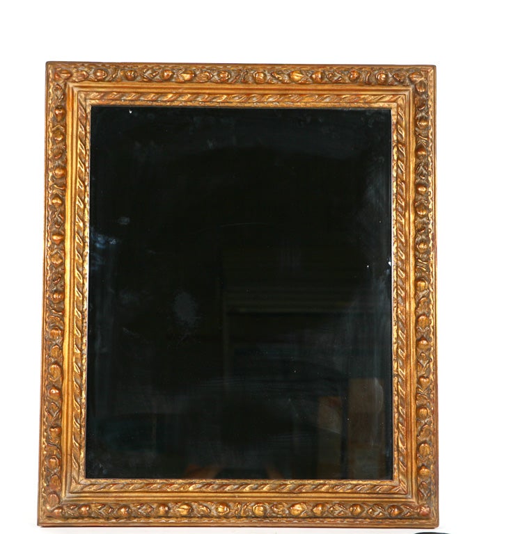 A rectangular giltwood framed mirror.